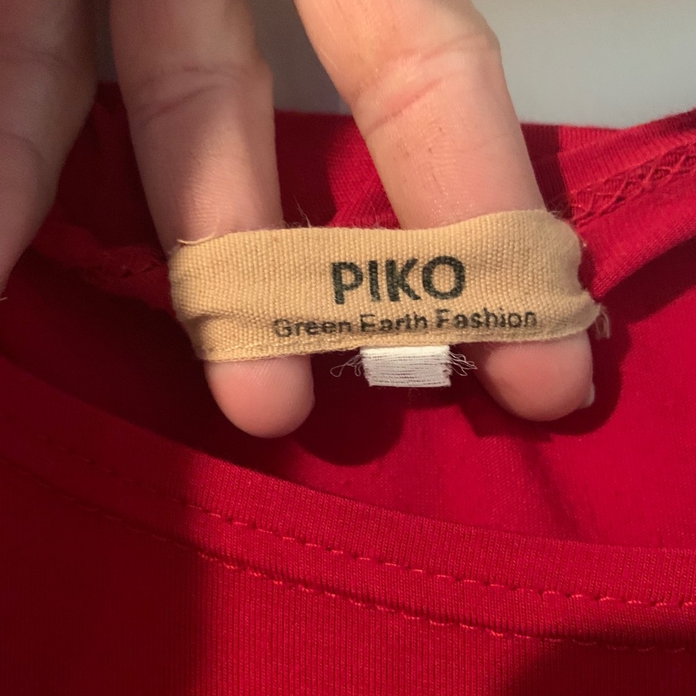 Red Piko shirt size medium